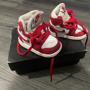 Infant red & white Jordan’s size 2c